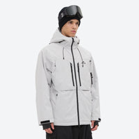 
                  
                    Men's 3-layer snowboard jacket and pants - light gray, on-model three-quarter front view, for resort and backcountry days
                  
                