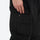 Men's 3-layer snowboard jacket and pants - black snow pants, cargo pocket close-up with hand, for skiing and snowboarding