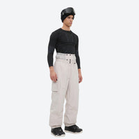 
                  
                    Men's breathable ski jacket and pants set - cream snow pants, on-model side view, for powder and piste riding
                  
                