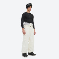 
                  
                    Men's waterproof 3L snow jacket and pants series - cream snow pants, on-model front view, for cold-weather winter sports
                  
                