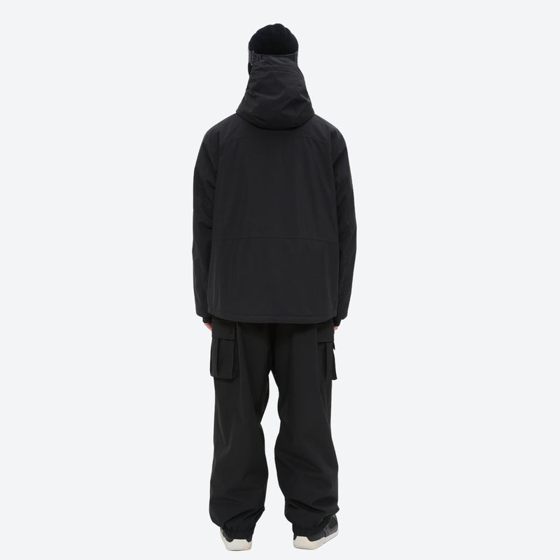 Men's 3-layer snowboard jacket and pants - black jacket with black pants, on-model back view, for resort and backcountry days