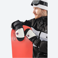 
                  
                    Water-repellent ski mittens with card pocket - black snow mittens on men in black jacket with snowboard, for resort ski days
                  
                