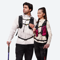 
                  
                    Lightweight waterproof pack with pocket organization - waterproof vest backpack on couple in white jackets
                  
                