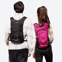 
                  
                    20L waterproof vest-style travel backpack - waterproof vest backpack on couple in white jackets, for travel and city walks
                  
                