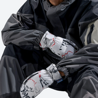 
                  
                    Enhanced comfort snow mittens with warm fleece - black and print snow mittens on model, for snow sports weekends
                  
                