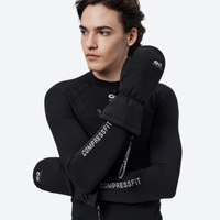 
                  
                    Snow mittens with touchscreen fingertips - black snow mittens on men, arms cross wear view, for skiing and snowboarding
                  
                