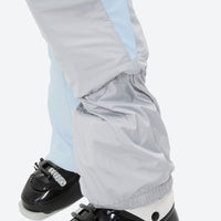 
                  
                    Women's one-piece snowboard suit with waist belt - ice blue, for cold-weather winter sports
                  
                