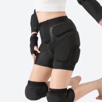 
                  
                    Shock-absorbing silicon protective gear for skiing - black silicon impact protection shorts on women with knee pads
                  
                