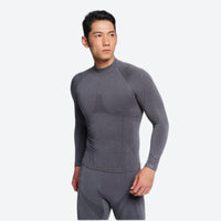 
                  
                    Warm merino wool baselayer suit for snow sports - gray merino compression base layer suit on men, for cold-weather training
                  
                