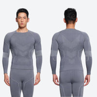 
                  
                    Warm merino wool baselayer suit for snow sports - gray merino compression base layer suit on men, for skiing and snowboarding
                  
                