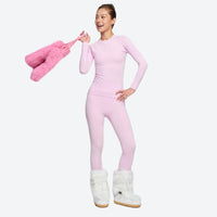 
                  
                    Merino wool compression base layer suit - pink merino compression base layer suit on women, for layering under ski wear
                  
                