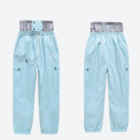 
                  
                    Kids snowboard jacket and pants with snow gaiters - ice blue kids snow pants, for family resort trips
                  
                