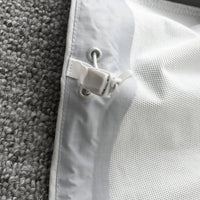 
                  
                    Men's lightweight stretch softshell jacket - white, hem drawstring toggle close-up detail, for spring and autumn layers
                  
                