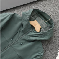 
                  
                    Men's lightweight stretch softshell jacket - green softshell jacket, for hiking and trekking
                  
                