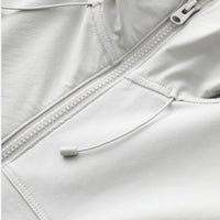 
                  
                    Men's breathable water-repellent softshell shell - white, chest zip close-up detail, for spring and autumn layers
                  
                