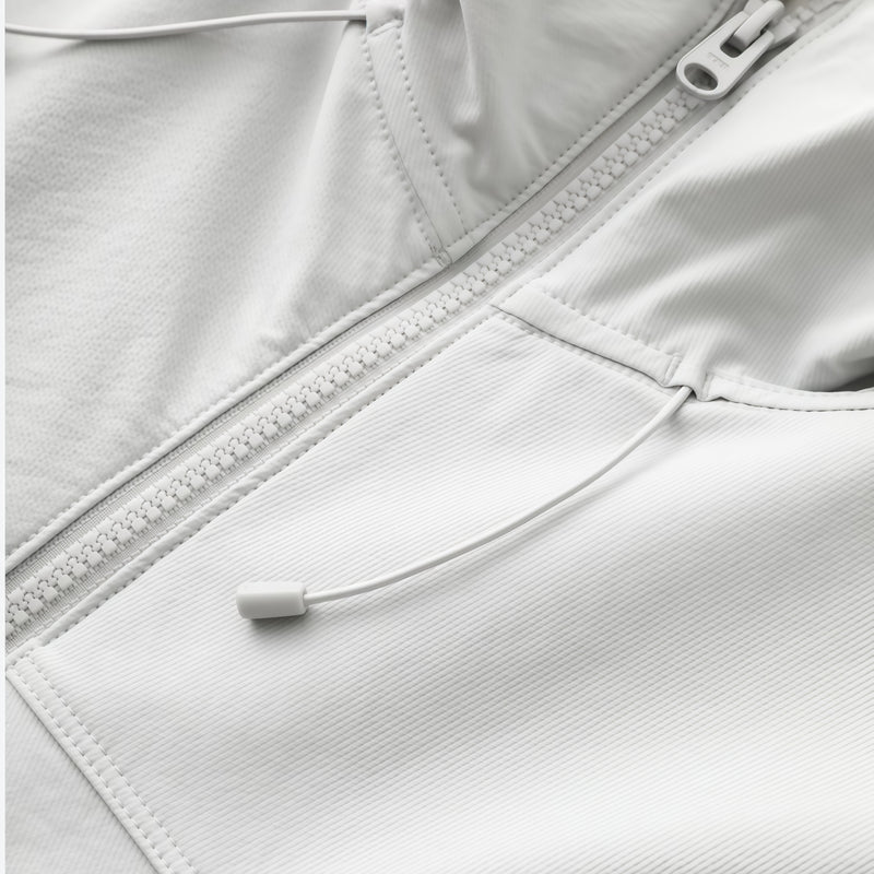 Men's breathable water-repellent softshell shell - white, chest zip close-up detail, for spring and autumn layers