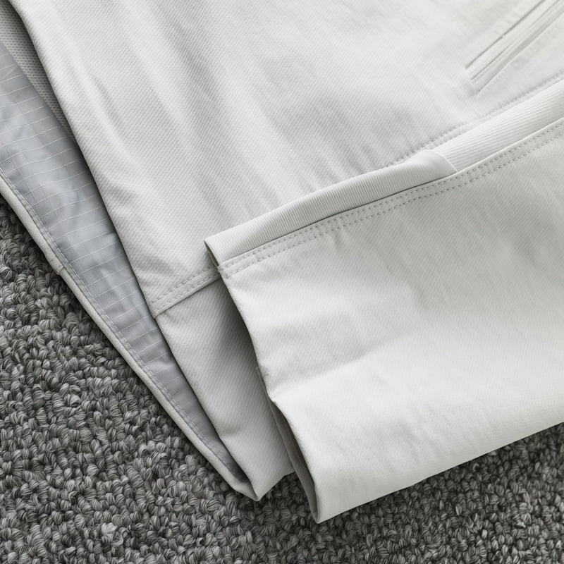 Men's waterproof softshell jacket - white, hem interior close-up detail, for travel and city commute