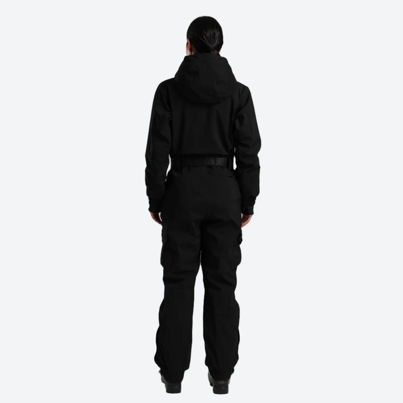 Women's 3L one-piece ski suit with hood - black 3l one-piece ski suit on women, back standing view, for resort ski days
