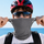 Merino wool sun face mask for outdoor sports - gray merino wool facemask on men with helmet and sunglasses, worn pull view