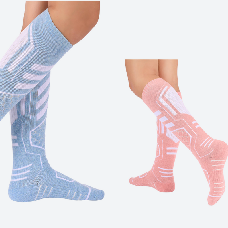 Cushioned compression socks for snow sports - compression merino ski socks on feet, for winter snow sports