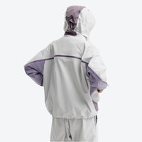 
                  
                    Unisex waterproof jacket with cape back vent - light gray waterproof jacket, for cold-weather outdoor wear
                  
                
