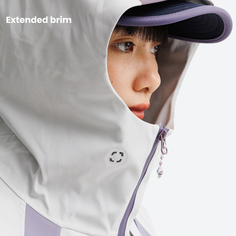 Unisex waterproof snowboard jacket with zip pockets - light gray, hood brim close-up with face, for hiking and travel