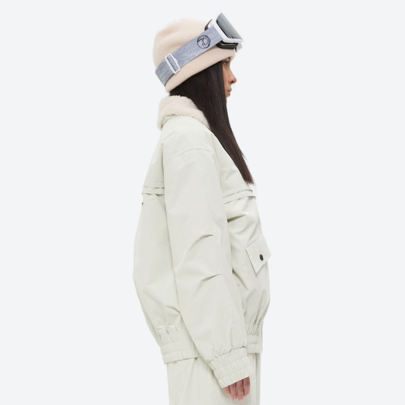 Unisex 3-layer snowboard jacket and pants - white jacket, on-model side view, for resort and street wear