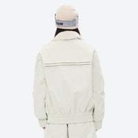 
                  
                    Unisex waterproof 3L snow jacket and pants series - white jacket, on-model back view, for powder days and winter commute
                  
                