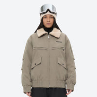 
                  
                    Unisex waterproof 3L snow jacket and pants series - tan jacket with sherpa collar, for cold-weather winter sports
                  
                