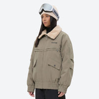 
                  
                    Unisex 3-layer snowboard jacket and pants - tan jacket with sherpa collar, for resort and street wear
                  
                