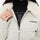 Unisex 3-layer snowboard jacket and pants - white jacket, collar close-up with hand, for skiing and snowboarding