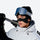 Cozy winter face patches for cheek and nose protection - black face patch on men in white jacket with goggles and snowboard