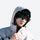 Soft winter face patches for ski days - white face patch on men with gray cap, worn front view, for winter mountain trips