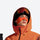 Cold weather face patches with ear loops - orange face patch on men in orange jacket with goggles, for snow sports weekends
