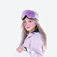 
                  
                    Cold weather face patches with ear loops - pink face patch on women in white jacket with goggles, for skiing and snowboarding
                  
                