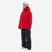 
                  
                    Unisex 3-layer snowboard jacket and pants - red jacket with black pants, on-model side view, for resort and backcountry days
                  
                