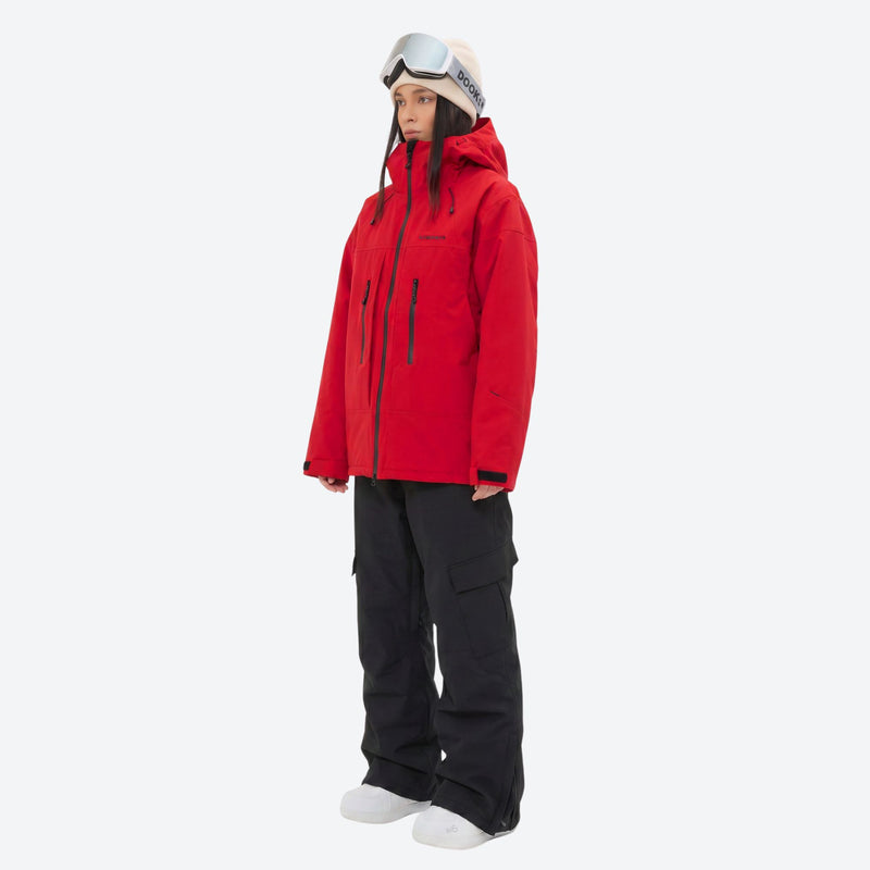 Unisex 3-layer snowboard jacket and pants - red jacket with black pants, on-model side view, for resort and backcountry days
