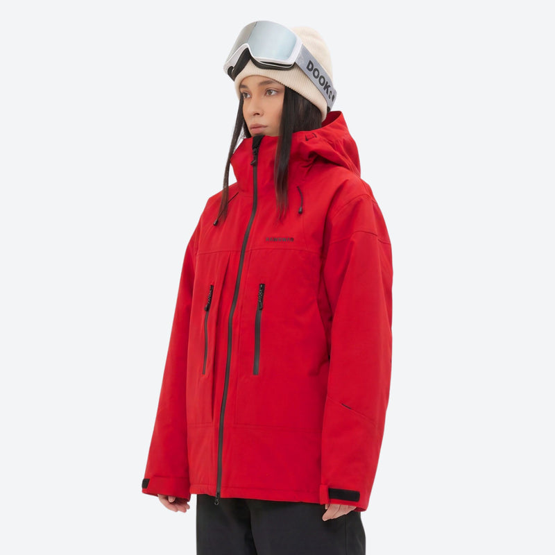 Unisex 3-layer snowboard jacket and pants - red jacket, on-model three-quarter front view, for powder and piste riding