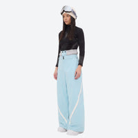 
                  
                    Women's 3-layer snowboard jacket and pants - ice blue snow pants with black top, for resort and street wear
                  
                