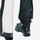 Women's adjustable ski pants with inner snow skirt - cream ski pants, hem snow skirt close-up with boot, for resort ski days