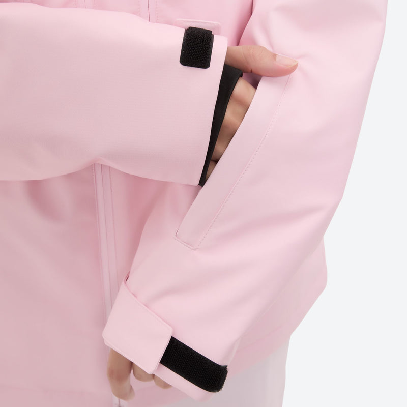 Women's waterproof 3L snow jacket and pants series - light pink, cuff close-up with hand, for powder and piste riding