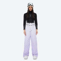 
                  
                    Women's waterproof 3L snow jacket and pants series - lavender snow pants, on-model front view, for powder and piste riding
                  
                