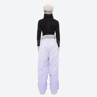 
                  
                    Women's 3-layer snowboard jacket and pants - lavender snow pants, on-model back view, for cold-weather winter sports
                  
                