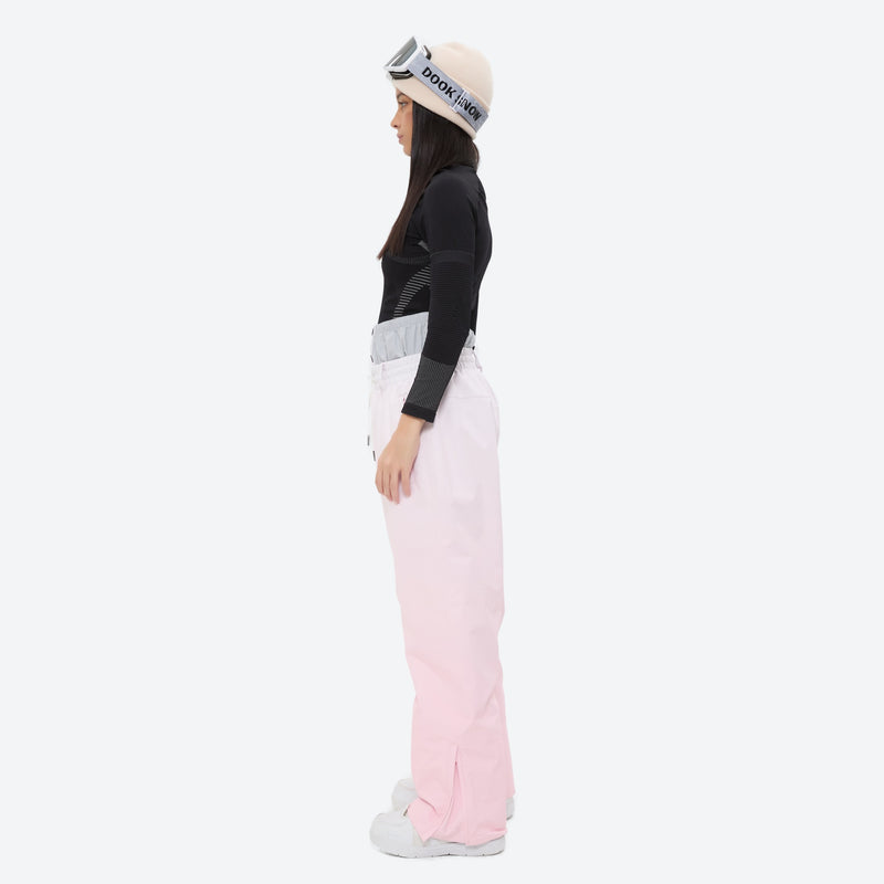 Women's 3-layer snowboard jacket and pants - light pink snow pants, on-model side view, for cold-weather winter sports