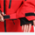 Men's 3L waterproof suspender snow pants - red, cuff strap close-up with hand, for deep powder winter days