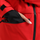Insulated bib snow pants for men - red, side pocket close-up with hand, for resort and backcountry days