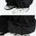 Men's waterproof 3L cargo snow pants - black, hem gaiter over shoe close-up, for powder and piste riding