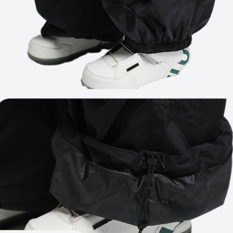 Men's waterproof 3L cargo snow pants - black, hem gaiter over shoe close-up, for powder and piste riding