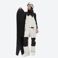 
                  
                    Women's 3L waterproof suspender snow pants - white bib pants, for cold-weather winter sports
                  
                