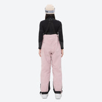 
                  
                    Insulated bib snow pants for women - pink bib pants, on-model back view, for deep powder winter days
                  
                